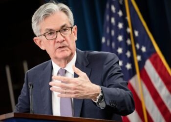 US stocks hit record highs after Fed Chair Powell says it will allow inflation to rise