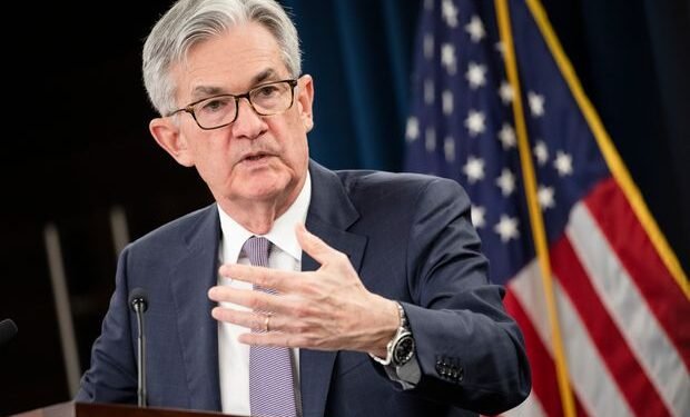 US stocks hit record highs after Fed Chair Powell says it will allow inflation to rise