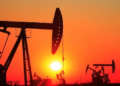 Brent rises to near $60 per barrel, lifted by supply cuts