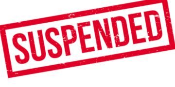 NGX suspends trading in the shares of four listed companies