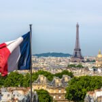 Skyline Paris with Eiffel Tower and French flag