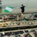 Guinness World Records holder Jaan Roose walks on a rope in Lagos